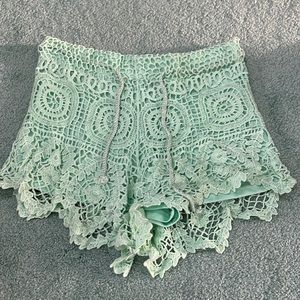 sea green crochet shorts